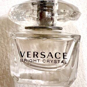 TINY BRIGHT CRYSTAL BOTTLE.  1/2 FULL